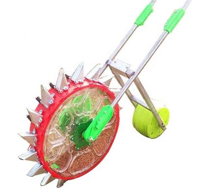 calidad  Farm machinery hand push vegetable seeder machine seed planter peanut bean onion seed planter small fábrica